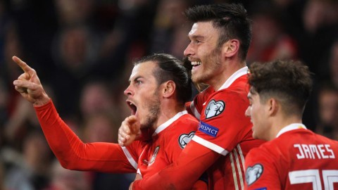 丹麦2-0苏格兰，哥本哈根雨夜童话破碎，北欧巨人豪取世预赛四连胜